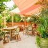 outside area with seating and greenery