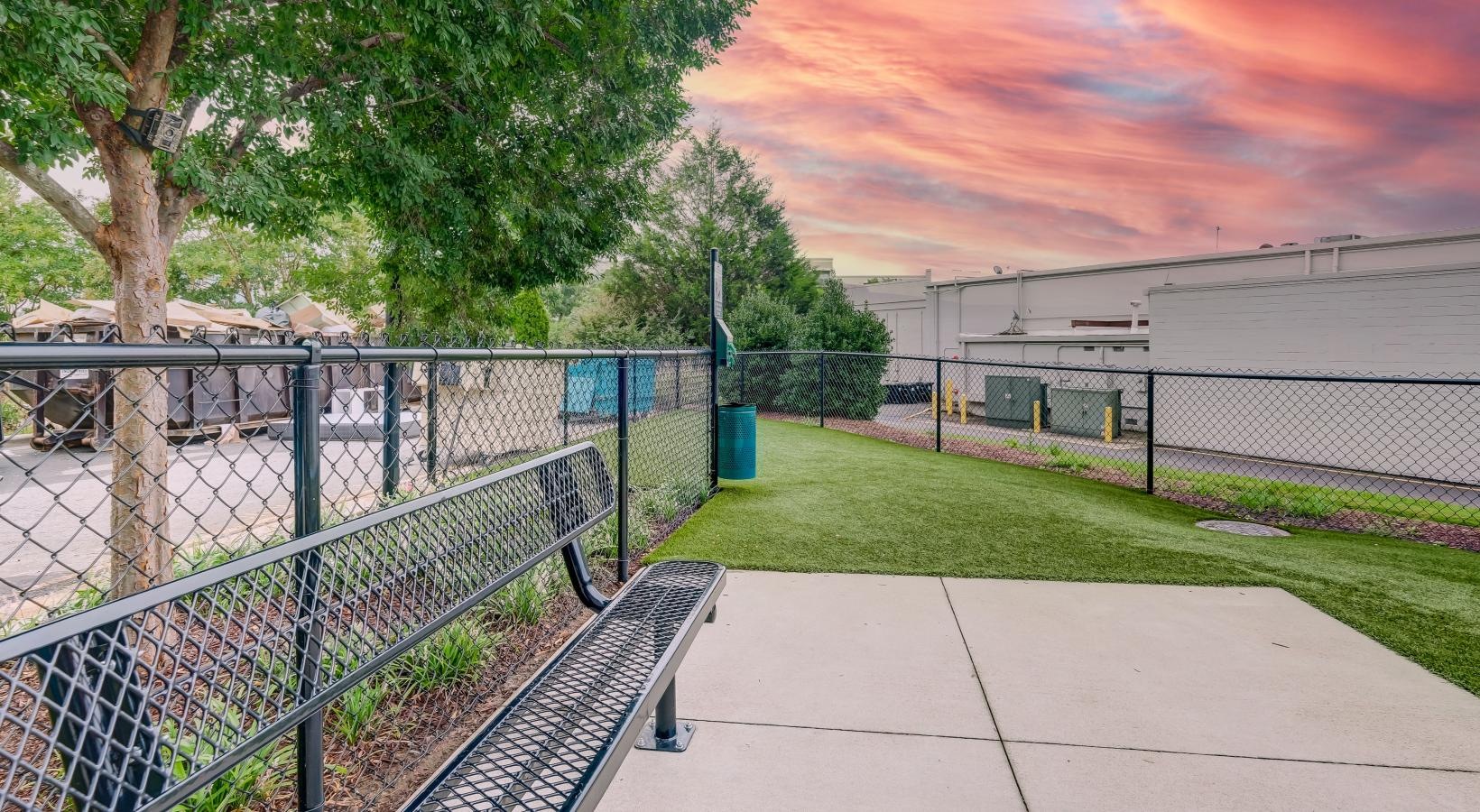 Berkshire Chapel Hill is a pet-friendly community! dog park with a bench