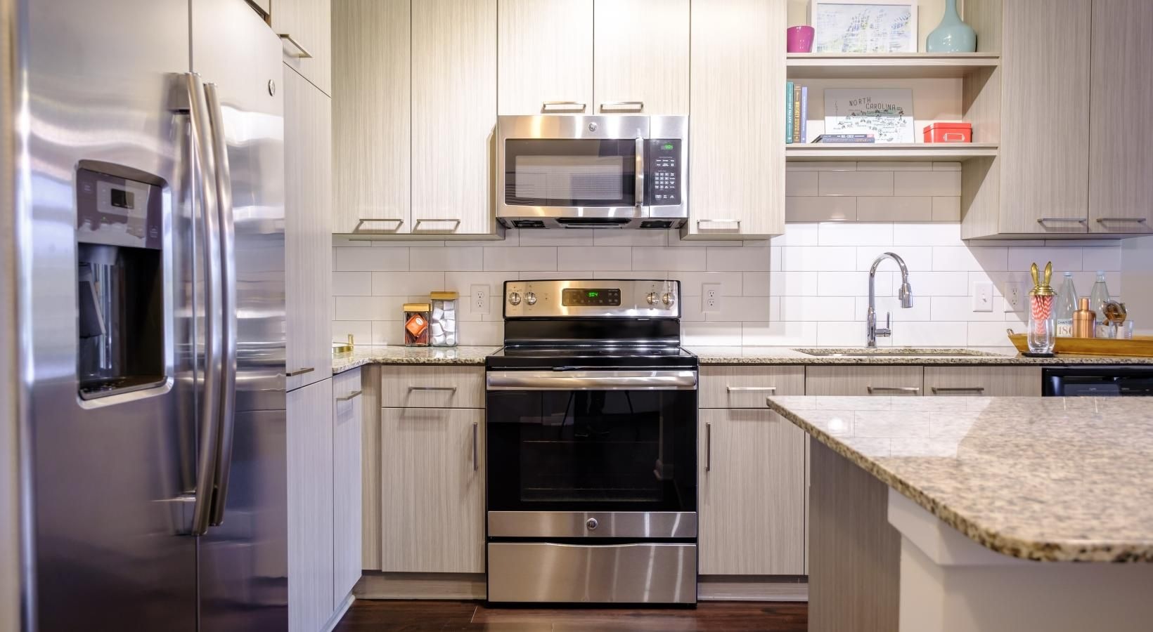 Beautiful kitchens with designer finishes a kitchen with stainless steel appliances