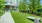 courtyard with cornhole and trees
