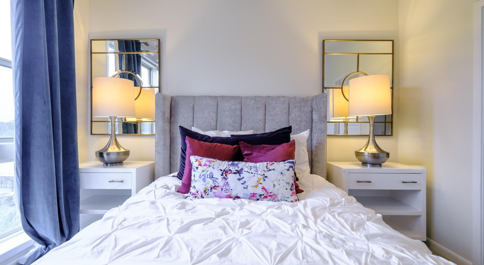 Beautiful bedrooms to fit every need a bed with a white bed spread