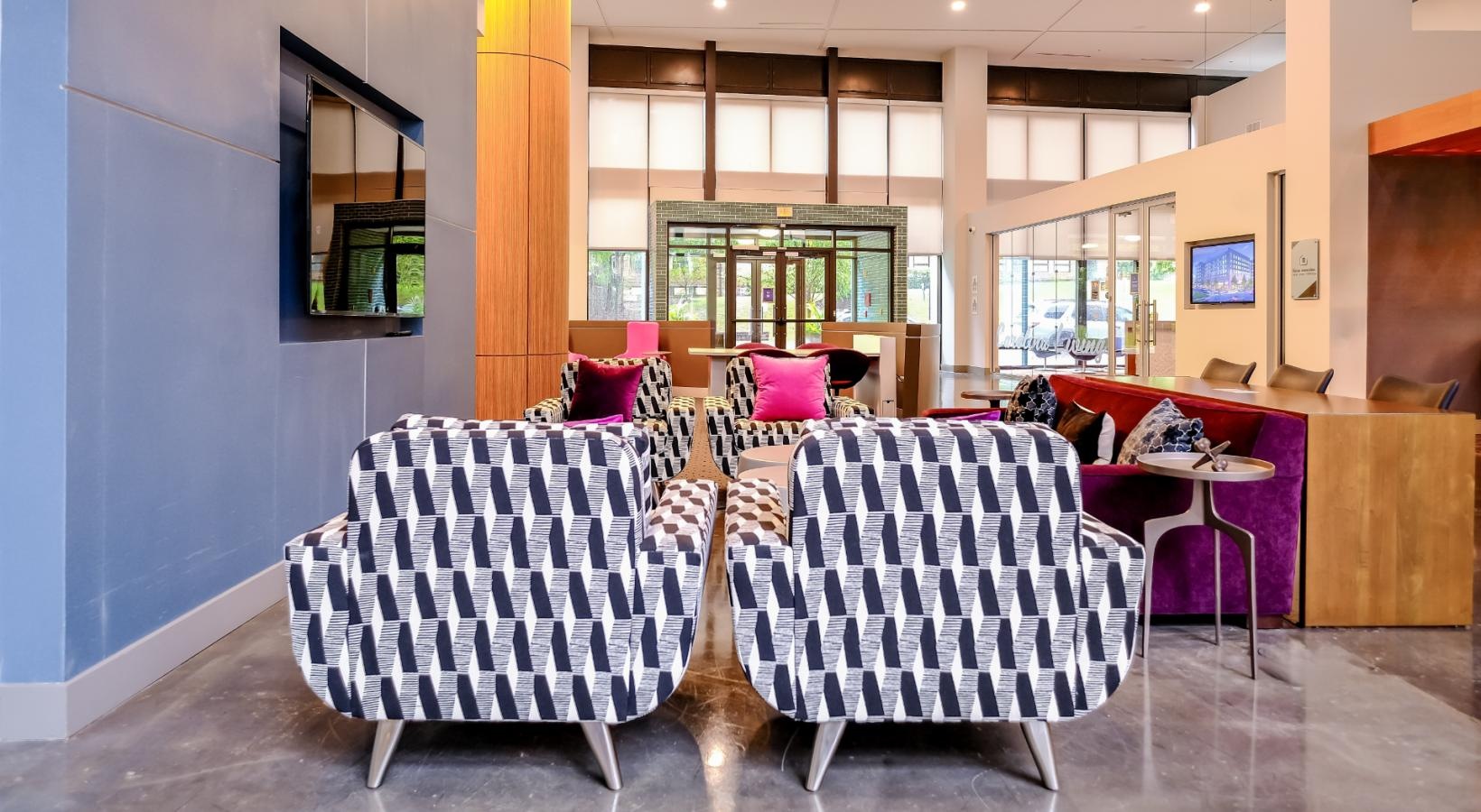 The essence of exceptional living a room with chairs and tables