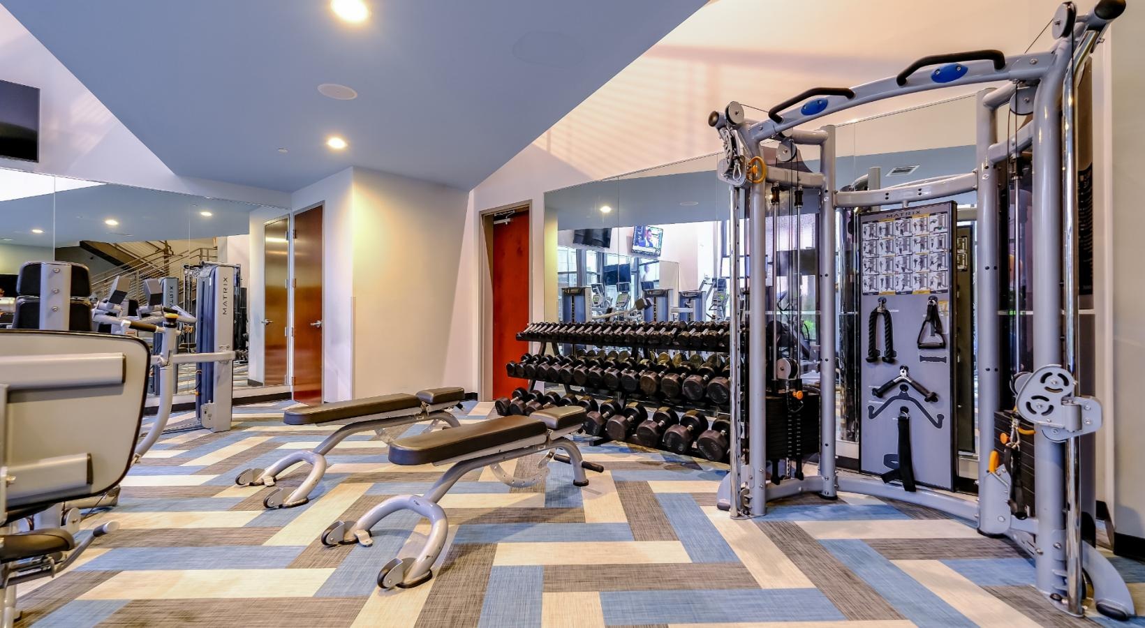 Cutting-edge amenities at your fingertips gym with exercise equipment