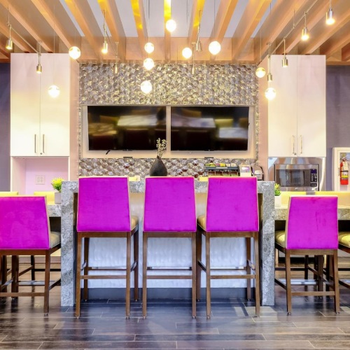 Everything within reach a room with a table and chairs