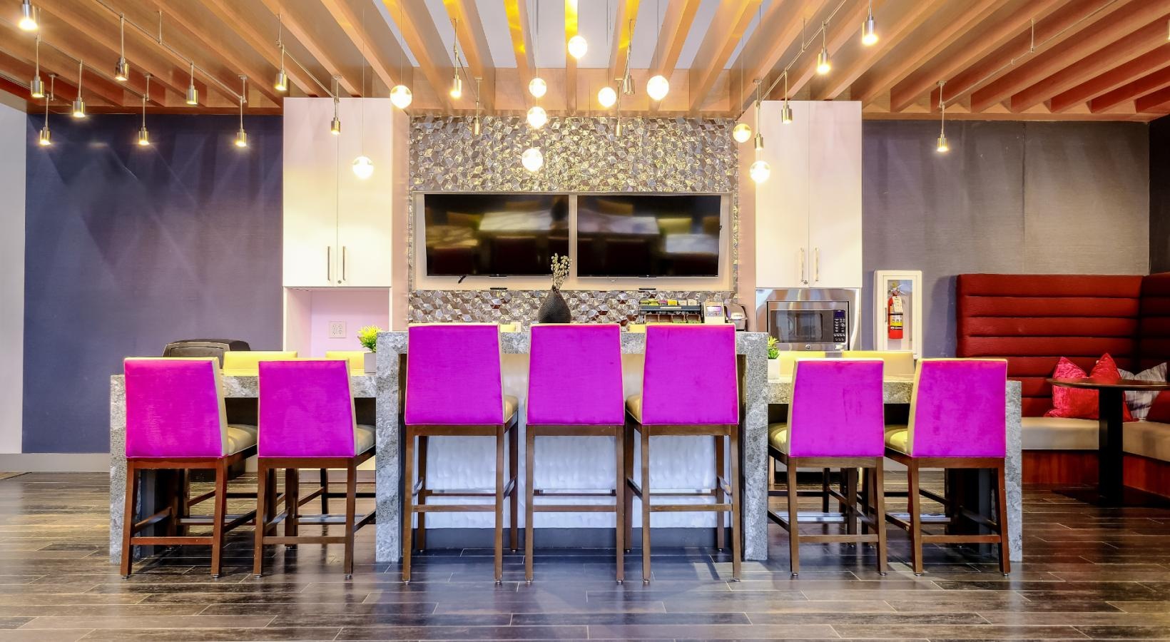 Everything within reach a room with a table and chairs