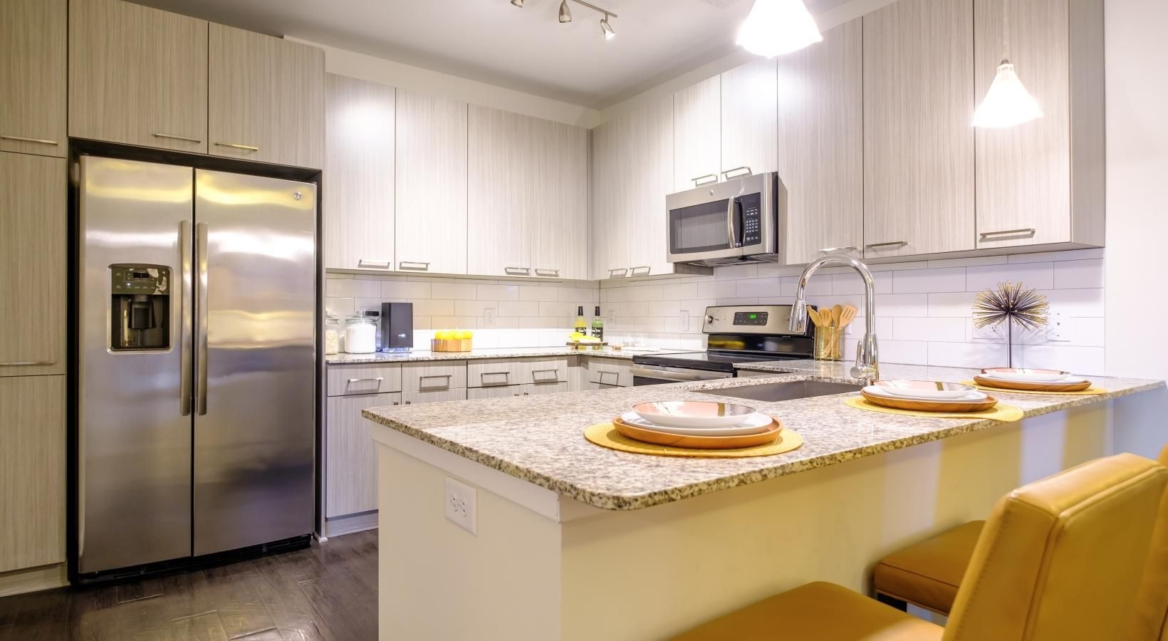 Spacious kitchens with thoughtful details a kitchen with a large island